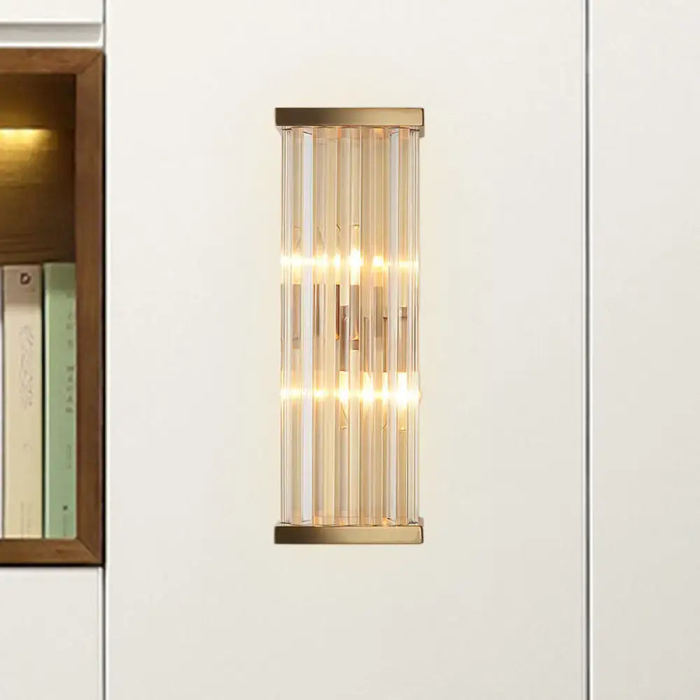 Gold crystal E12 wall sconce with vertical glass rods and warm LED light on Tampa Home & Garden Store