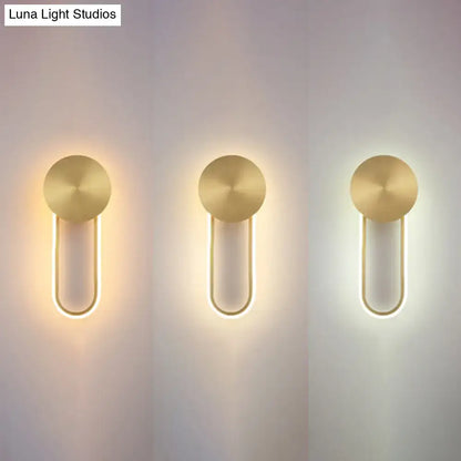 Gold elliptical wall sconces trio with circular backplates and U-shaped LED light tubes on Tampa Home & Garden Store