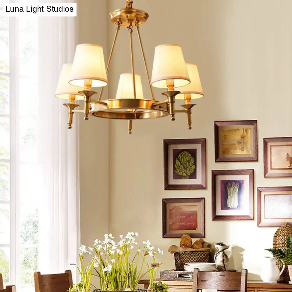 Gold fabric ceiling chandelier, brass finish with ivory lampshades, Decorbites on Tampa Home & Garden Store