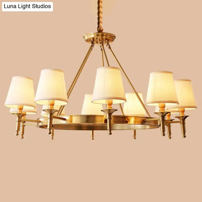 Gold fabric ceiling chandelier with brass frame and cream lampshades, Decorbites chandelier on Tampa Home & Garden Store