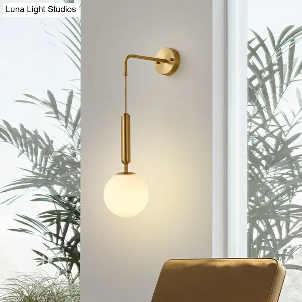 Gold Cream Glass Sconce with frosted globe shade and brass finish by Decorbites on Tampa Home & Garden Store