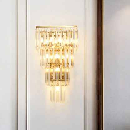 Gold crystal tiered block sconce with cascading crystals and gold metal frame by Decorbites on Tampa Home & Garden Store