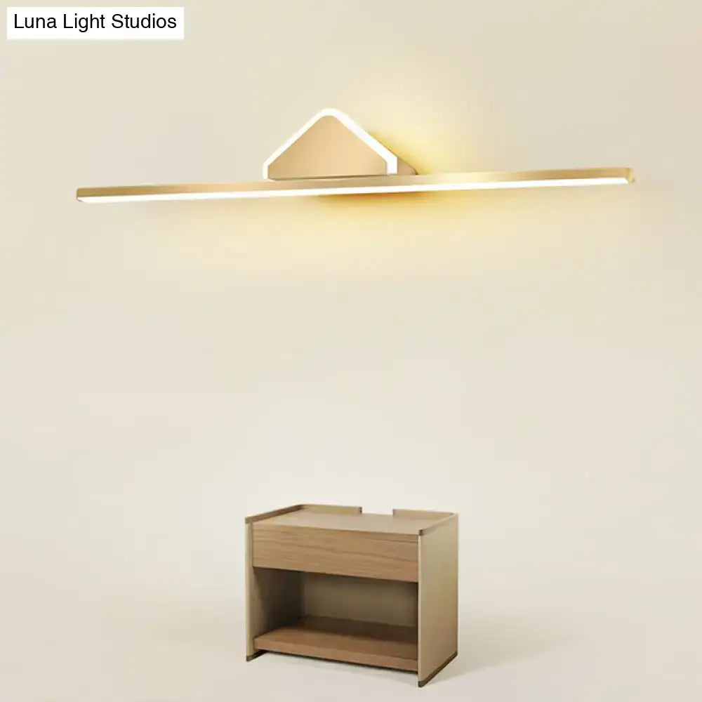 Decorbites gold LED linear semicircle vanity light wall-mount above wooden cabinet on Tampa Home & Garden Store