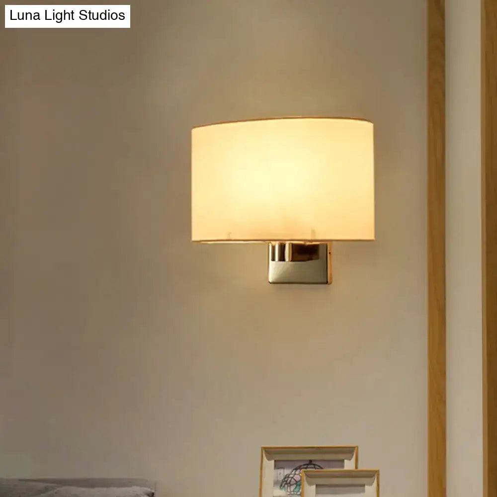 Gold rectangular fabric sconce by Decorbites with cream shade and sleek metal mount on wall on Tampa Home & Garden Store