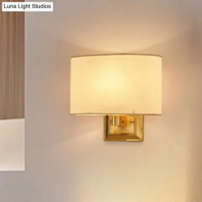 Decorbites gold rectangular fabric sconce with brass mount on Tampa Home & Garden Store