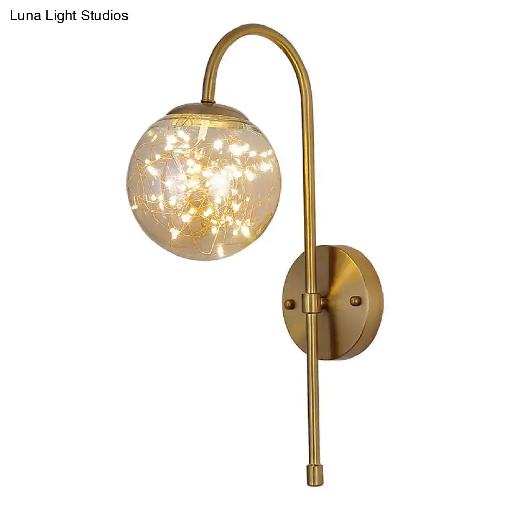 Gold brass gooseneck wall light with glass globe of LED wire lights Decorbites on Tampa Home & Garden Store
