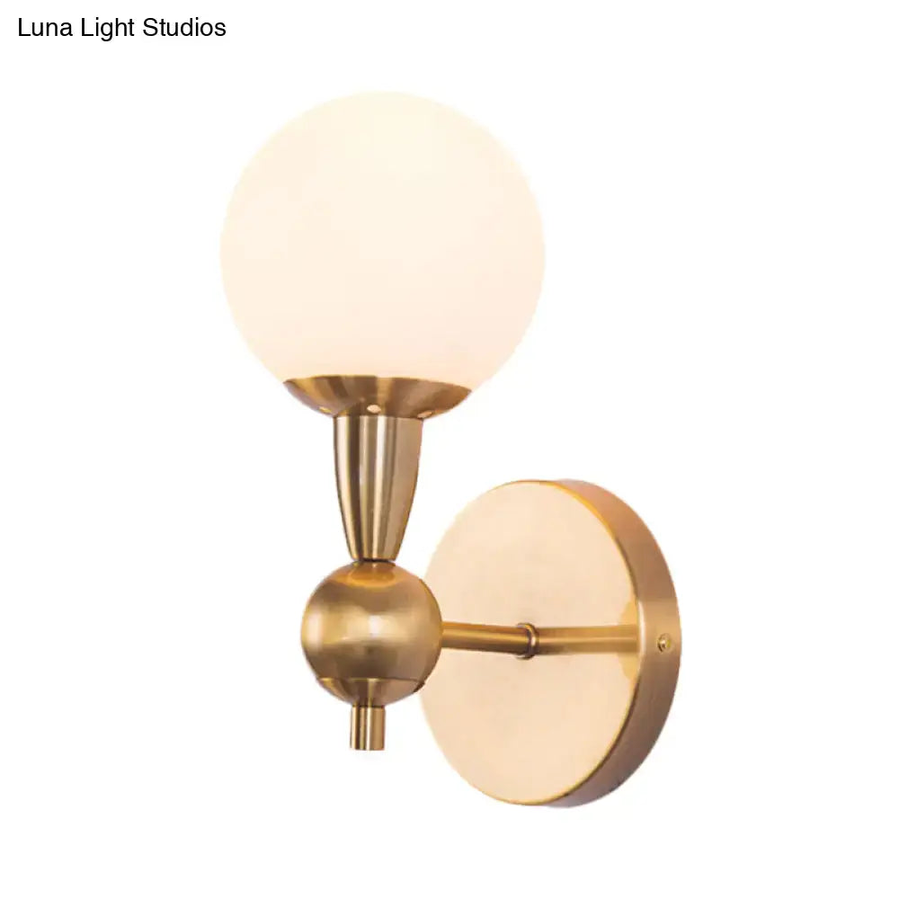 Decorbites gold hand blown sconce wall light with frosted glass globe brass finish on Tampa Home & Garden Store
