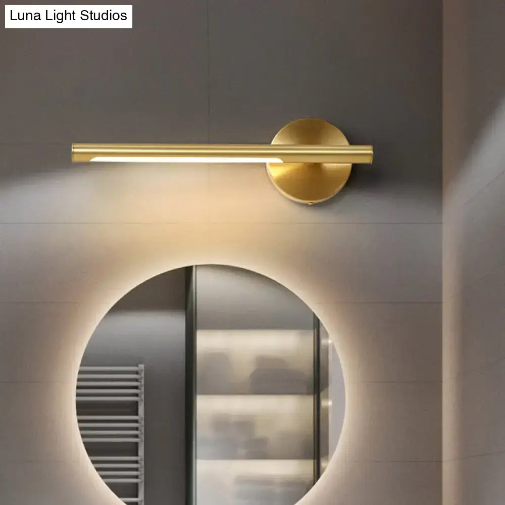 Gold LED wall light metal fixture with cylindrical bar on round mount on Tampa Home & Garden Store