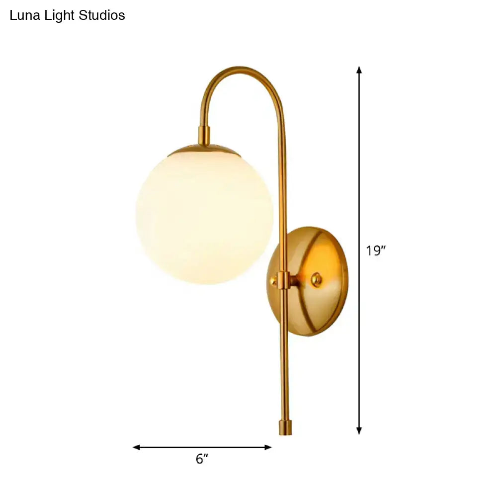 Gold Mini Globe Sconce by Decorbites; gold metal wall lamp with frosted globe, 19in tall on Tampa Home & Garden Store