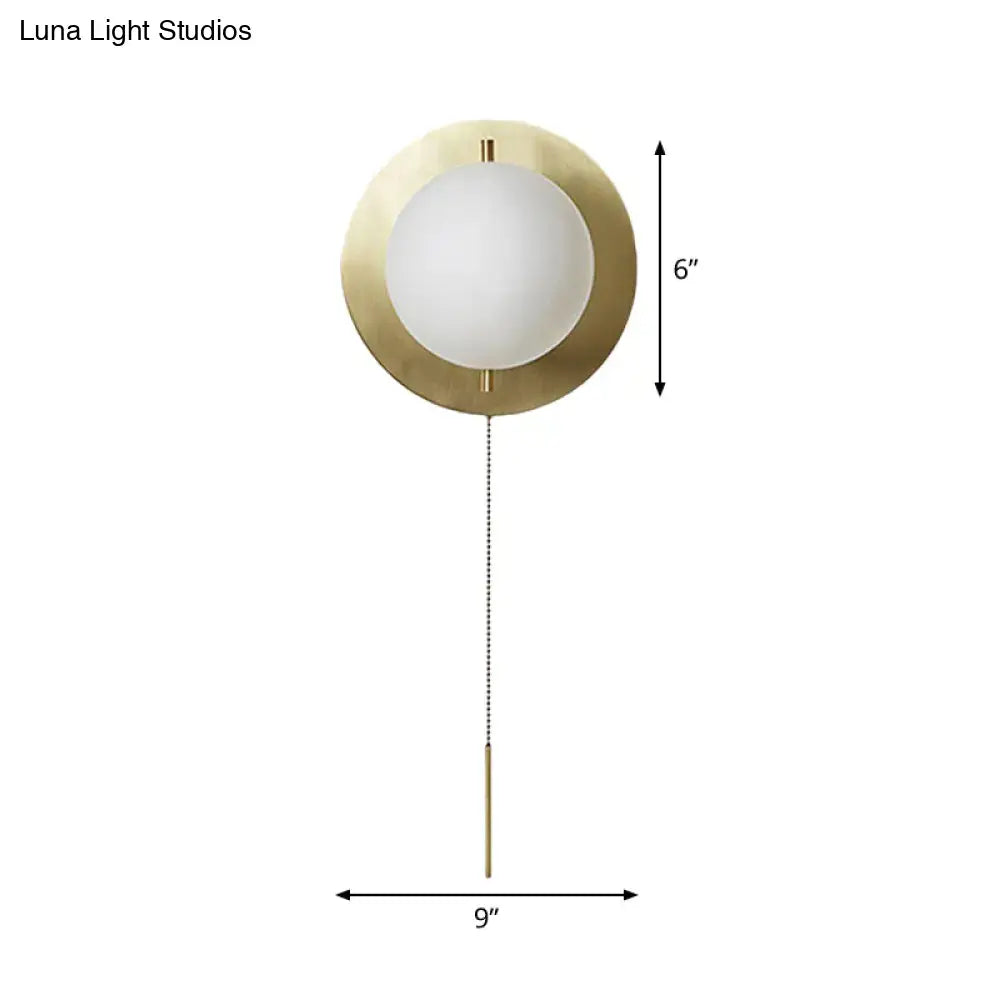 Gold Mini Globe Sconce with white glass globe on brass backplate, pull chain Decorbites on Tampa Home & Garden Store