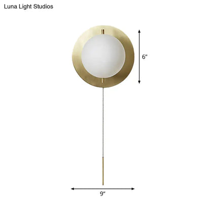 Gold Mini Globe Sconce with white glass globe on brass backplate, pull chain Decorbites on Tampa Home & Garden Store