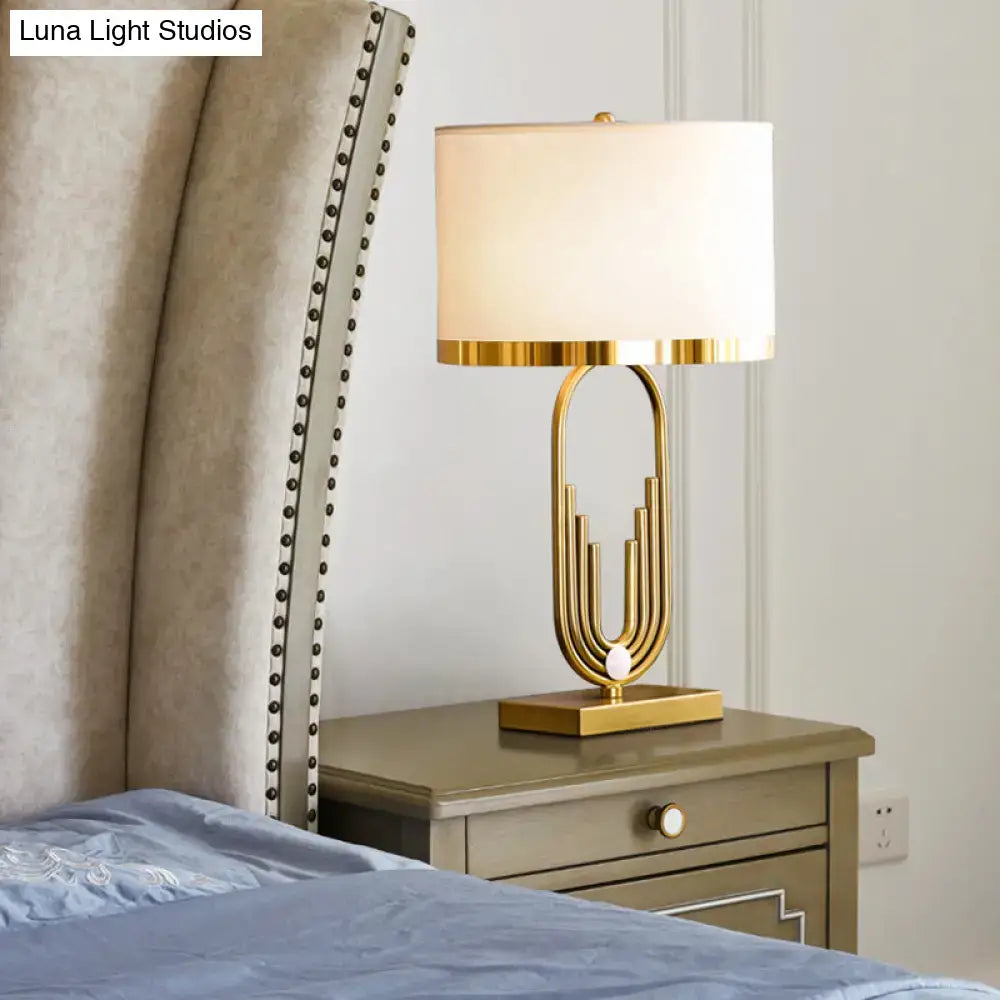 Gold paperclip table lamp by Decorbites with cream lampshade and gold base on Tampa Home & Garden Store