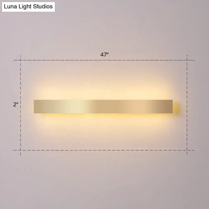 Gold plated LED wall sconce, minimalist rectangular bar light, 47in wide, warm wall glow on Tampa Home & Garden Store