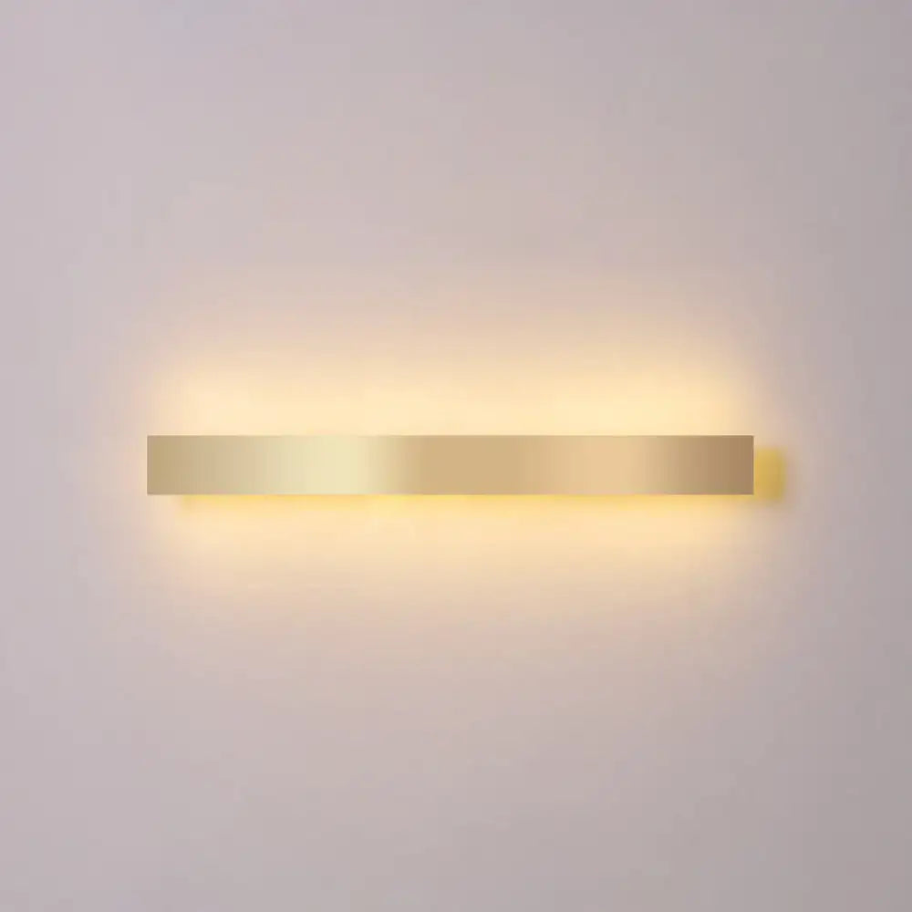 Minimalist gold plated LED wall sconce bar with warm glow for modern living on Tampa Home & Garden Store