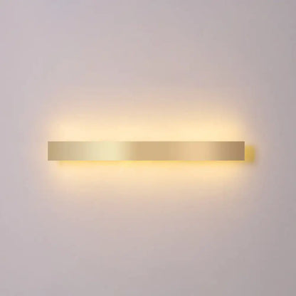 Minimalist gold plated LED wall sconce bar with warm glow for modern living on Tampa Home & Garden Store