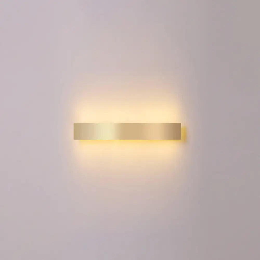 Minimalist gold plated LED wall sconce bar light, warm ambient glow, wall-mount design on Tampa Home & Garden Store