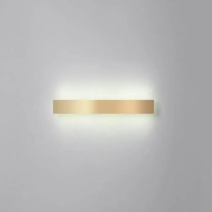 Minimalist gold plated LED wall sconce bar light by Decorbites with warm glow on Tampa Home & Garden Store