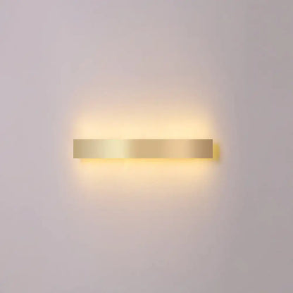 Minimalist gold plated LED wall sconce bar light by Decorbites, warm glow on Tampa Home & Garden Store