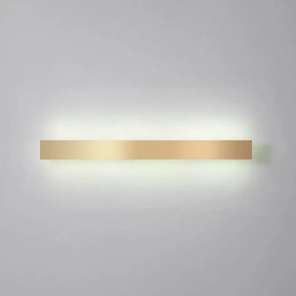 Minimalist gold plated LED wall sconce bar light with warm glow on Tampa Home & Garden Store