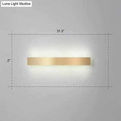 Minimalist gold plated LED wall sconce Decorbites, 31.5-inch wide horizontal bar with soft glow on Tampa Home & Garden Store