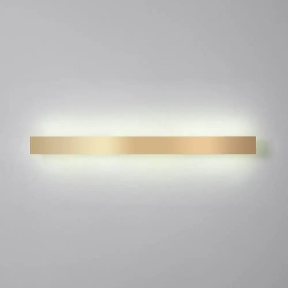 Gold plated LED wall sconce bar light, minimalist Decorbites design, warm glow on Tampa Home & Garden Store