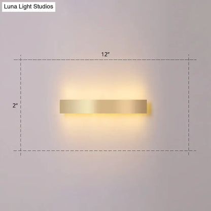 Minimalist gold plated LED wall sconce bar light, 12in long with warm ambient glow on Tampa Home & Garden Store