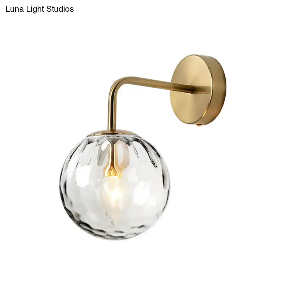 Gold Rippled Glass Lamp wall sconce with brass curved arm and faceted glass globe Decorbites on Tampa Home & Garden Store
