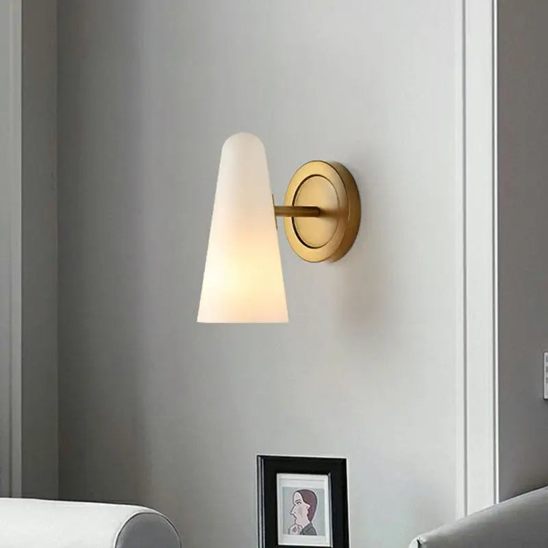 Gold frosted glass wall sconce with brass finish and cone-shaped shade Decorbites on Tampa Home & Garden Store