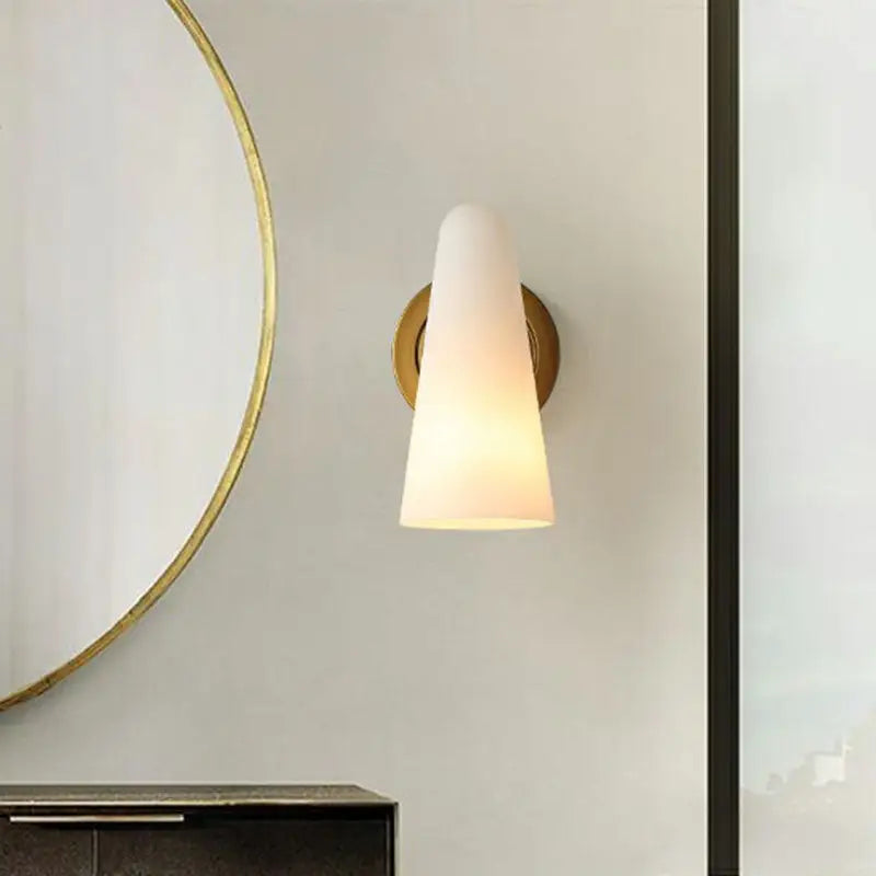 Gold frosted glass sconce with brass backplate by Decorbites cone-shaped shade wall light on Tampa Home & Garden Store