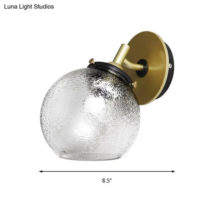Gold water-glass globe wall sconce with brass mounting by Decorbites on Tampa Home & Garden Store