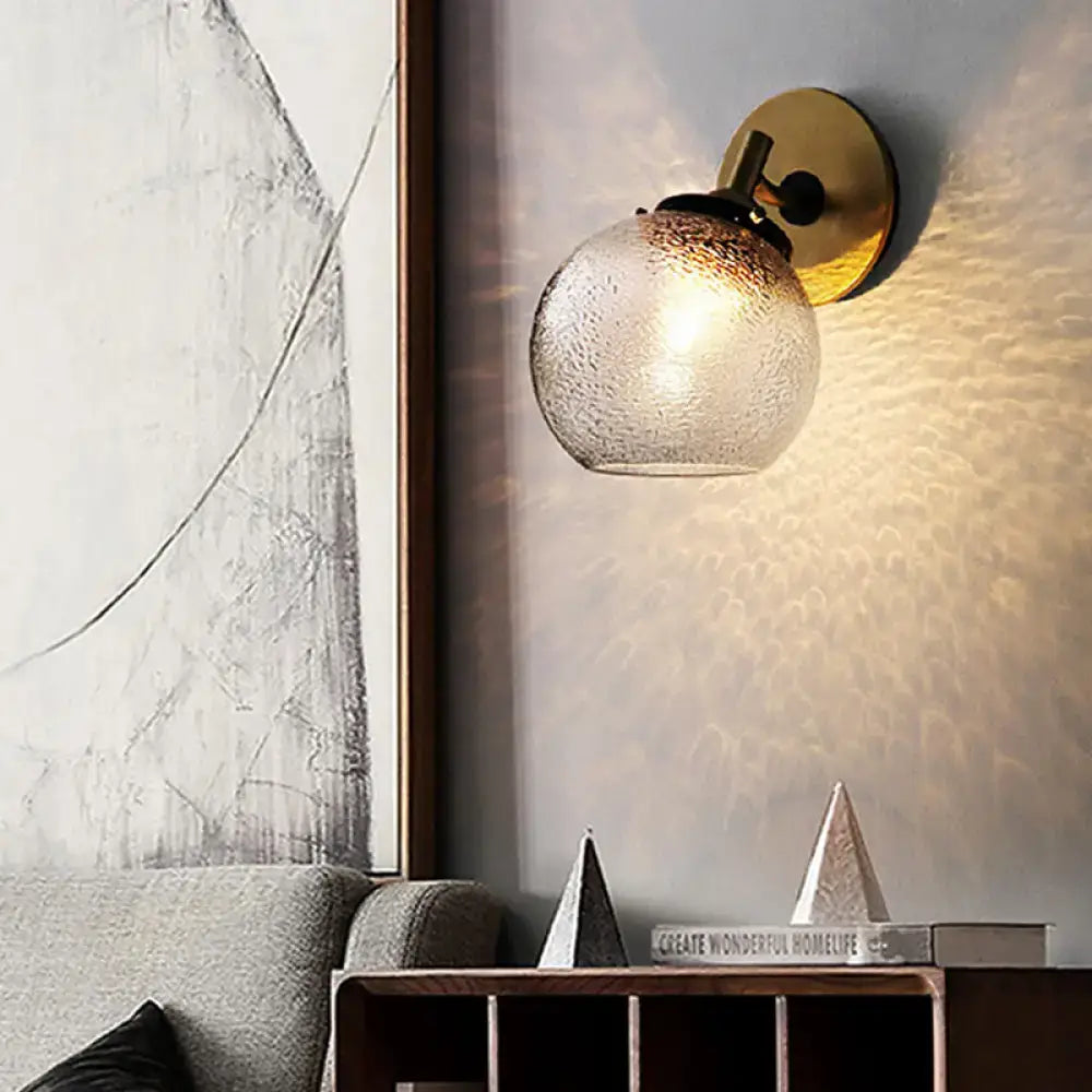 Decorbites gold water glass globe sconce with downward light, brass wall mount on Tampa Home & Garden Store