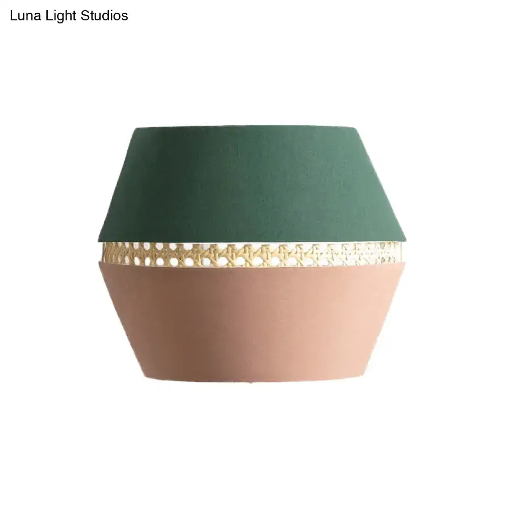 Terracotta rattan wall light with green conical shade and woven band by Decorbites on Tampa Home & Garden Store