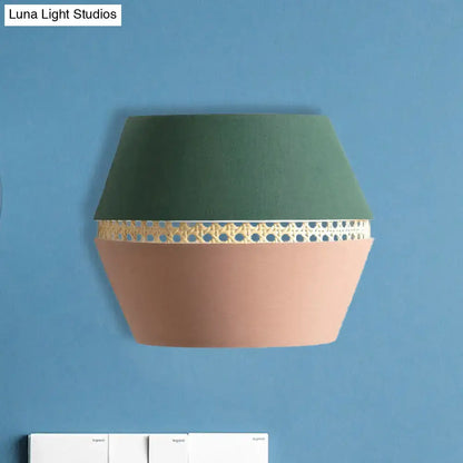 Terracotta rattan wall light with green shade and woven band by Decorbites on Tampa Home & Garden Store