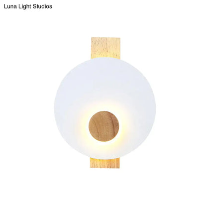 Gray metal disk sconce with frosted glass globe and wood backplate Decorbites on Tampa Home & Garden Store