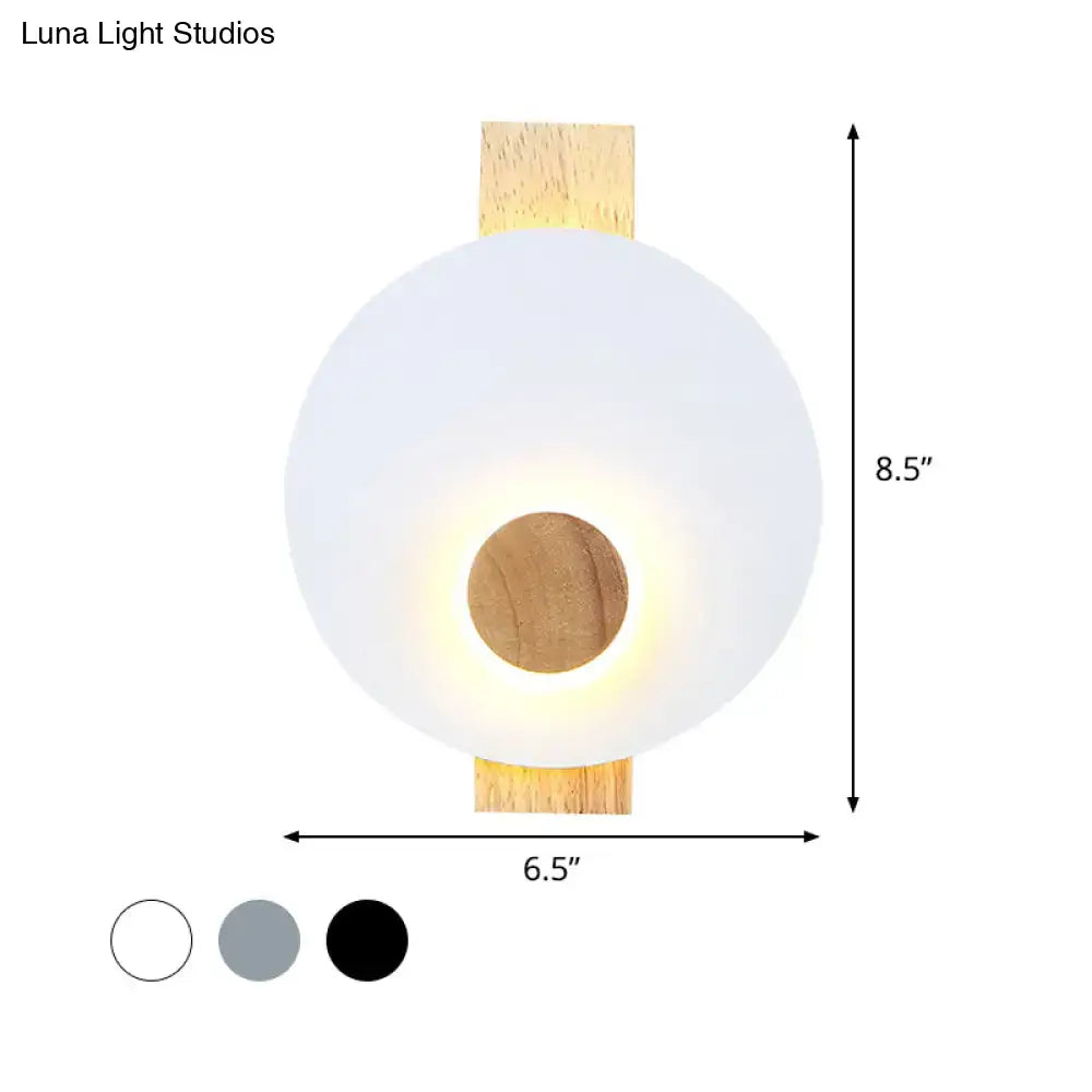 Gray metal disk sconce by Decorbites 8.5in tall, 6.5in wide on Tampa Home & Garden Store