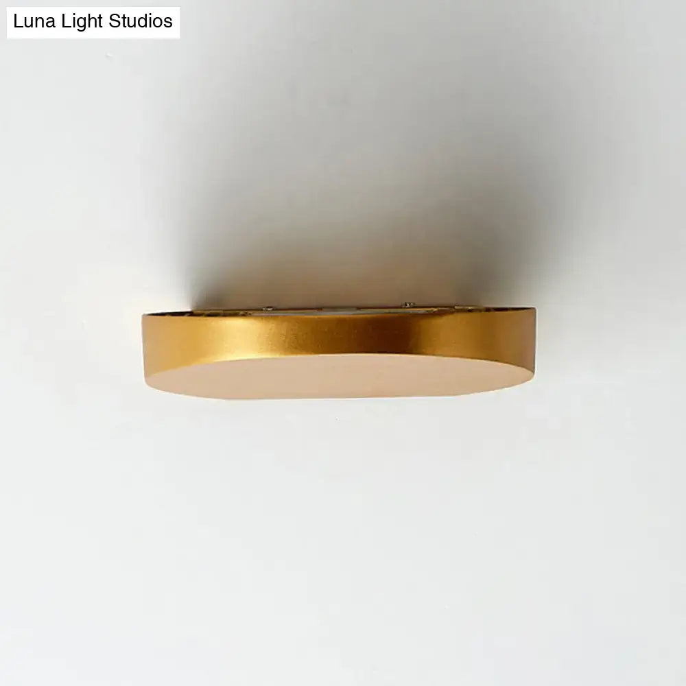 Grey aluminum minimalist corridor sconce with brass ring and white diffuser by Decorbites on Tampa Home & Garden Store