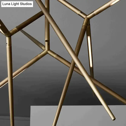 Black Gold Starburst Chandelier by Decorbites; gold-tone metal starburst with angular spokes on Tampa Home & Garden Store