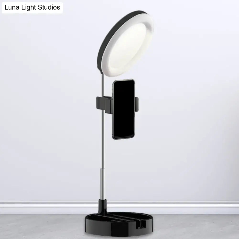 Black metal ring light with phone holder on adjustable chrome stand by Decorbites on Tampa Home & Garden Store