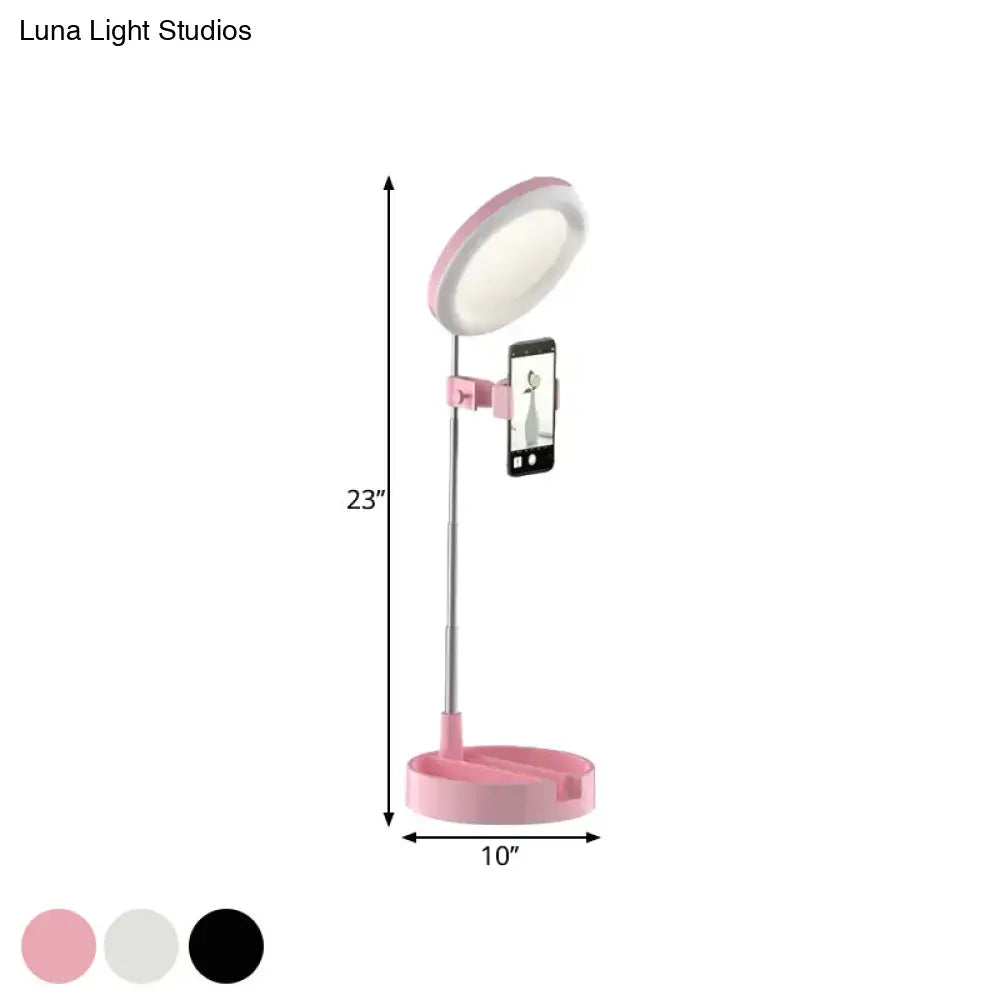 Black metal ring light by Decorbites with phone holder on adjustable stand on Tampa Home & Garden Store