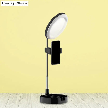 Decorbites black metal ring light with phone holder on an adjustable tripod stand on Tampa Home & Garden Store