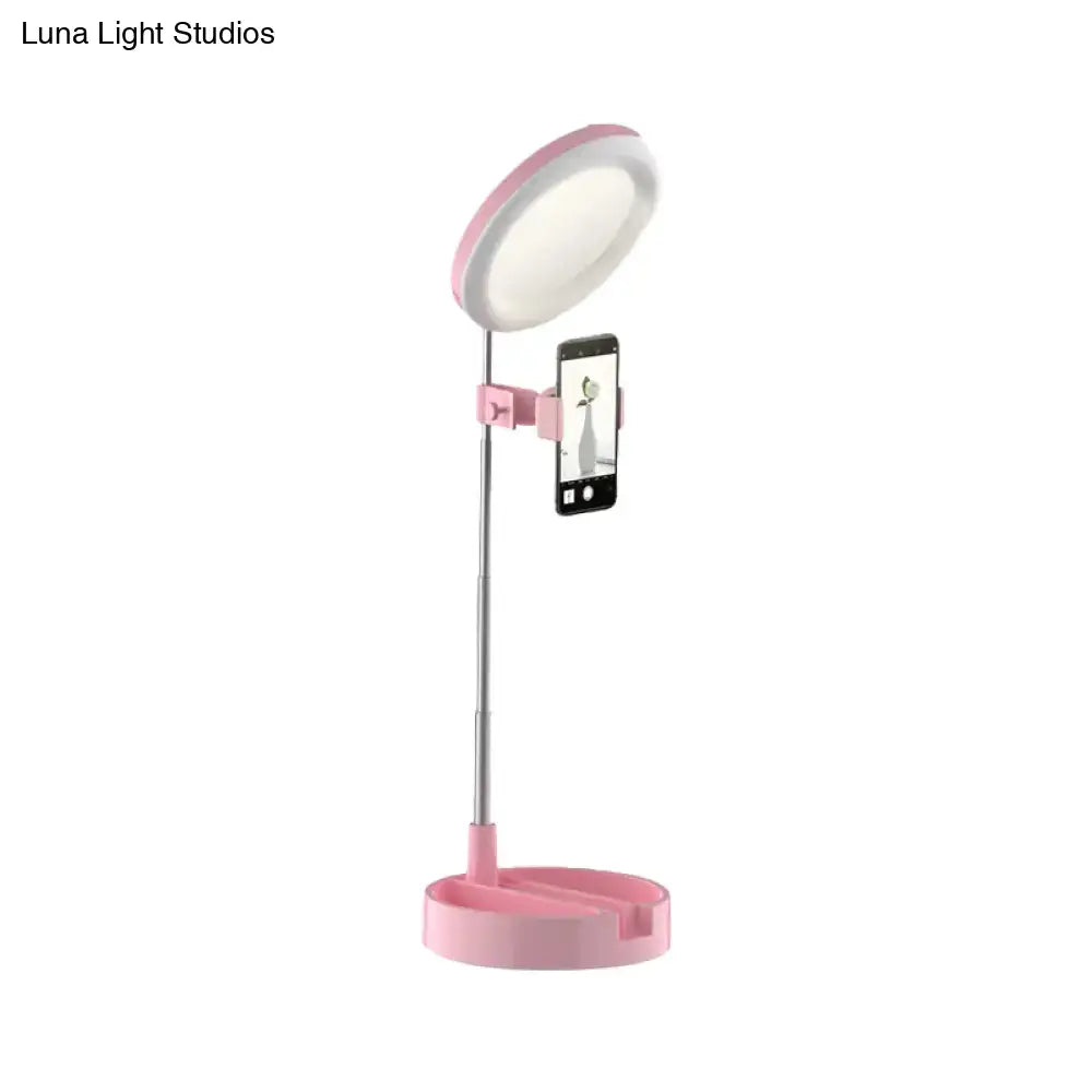 Black metal ring light on pink adjustable stand with phone holder Decorbites on Tampa Home & Garden Store