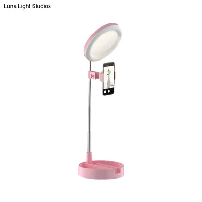 Black metal ring light on pink adjustable stand with phone holder Decorbites on Tampa Home & Garden Store