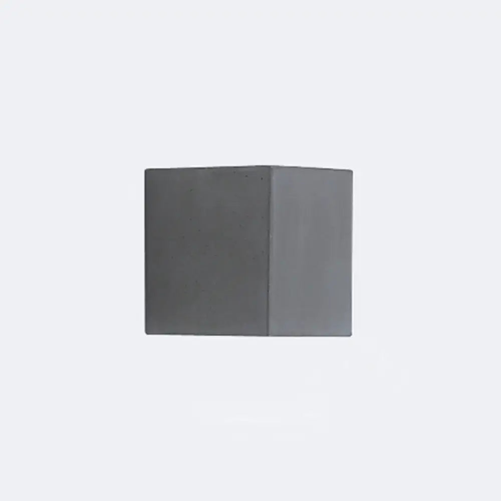 Gray concrete wall sconce by Decorbites; square block design in two gray tones on Tampa Home & Garden Store