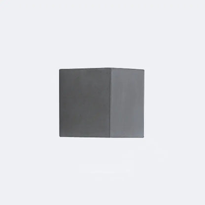 Gray concrete wall sconce by Decorbites; square block design in two gray tones on Tampa Home & Garden Store