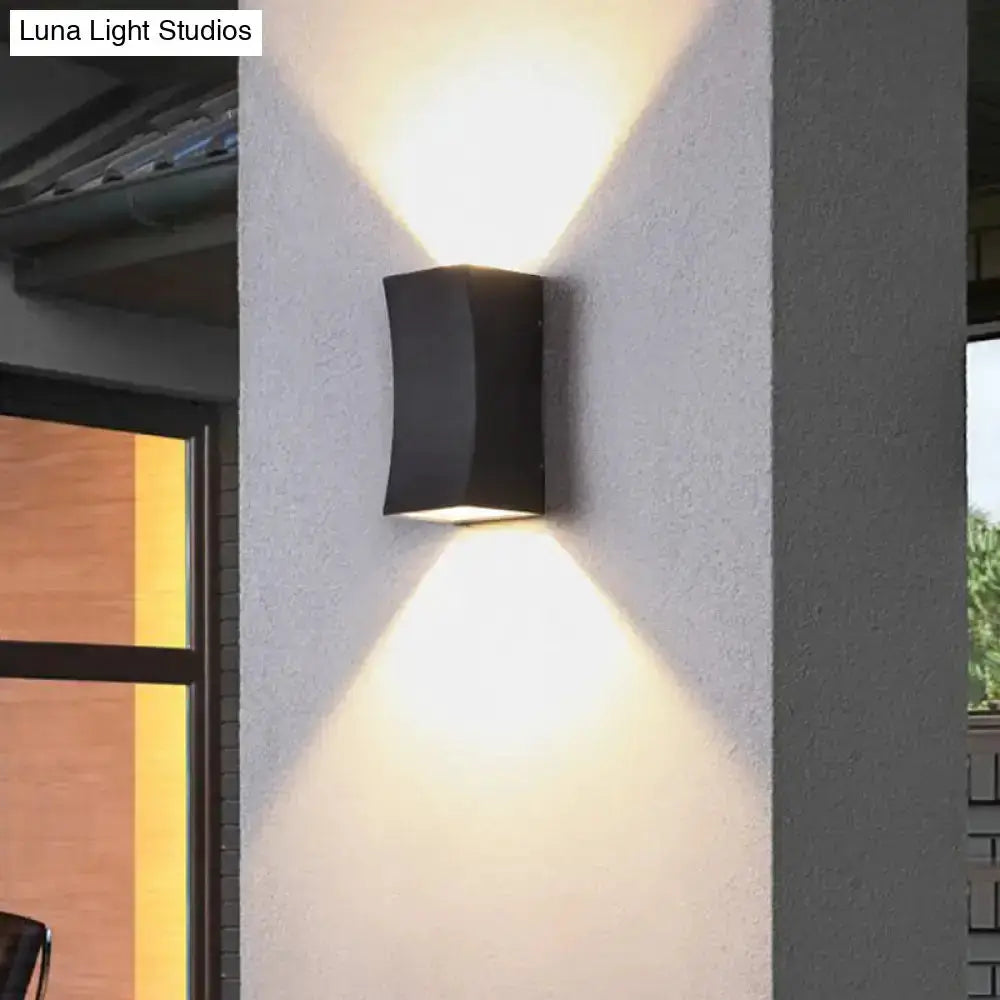 Minimalist black curved metal wall sconce by Decorbites, living room lighting on Tampa Home & Garden Store