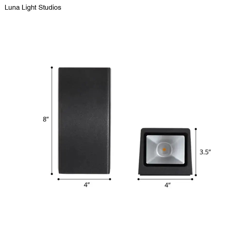 Black metal curved wall mount sconce with 8in back plate and 4x3.5in light housing on Tampa Home & Garden Store