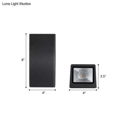 Black metal curved wall mount sconce with 8in back plate and 4x3.5in light housing on Tampa Home & Garden Store