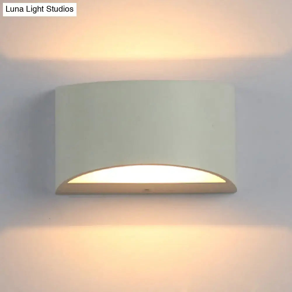 Curved Metal Wall Sconce by Decorbites in white finish, warm LED glow on Tampa Home & Garden Store
