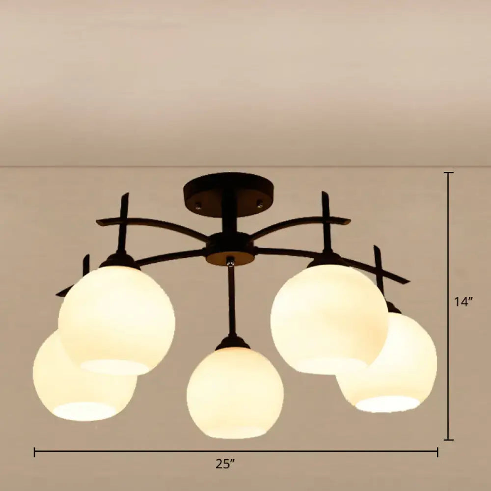Opal glass black chandelier with frosted globes on a dark metal frame on Tampa Home & Garden Store