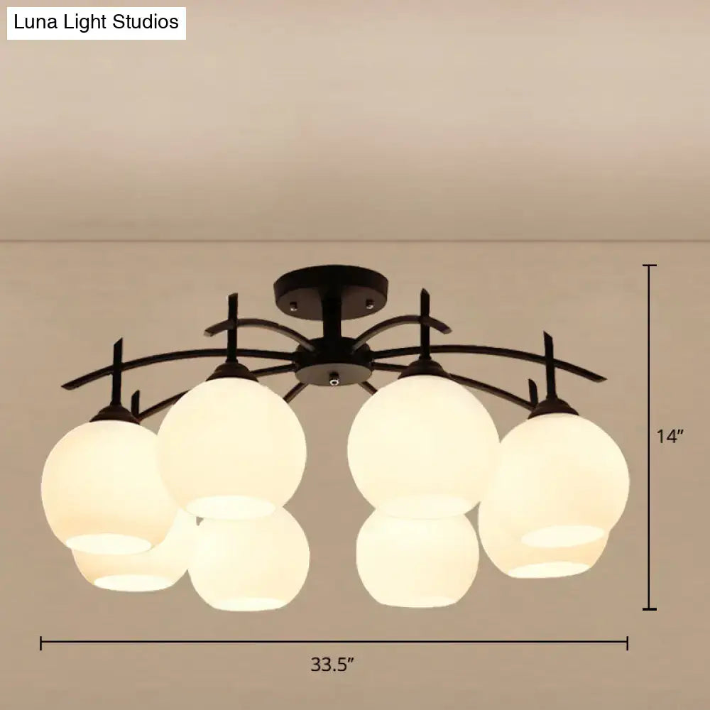 Opal Glass Black Chandelier by Decorbites with six frosted globes on a curved black metal frame on Tampa Home & Garden Store